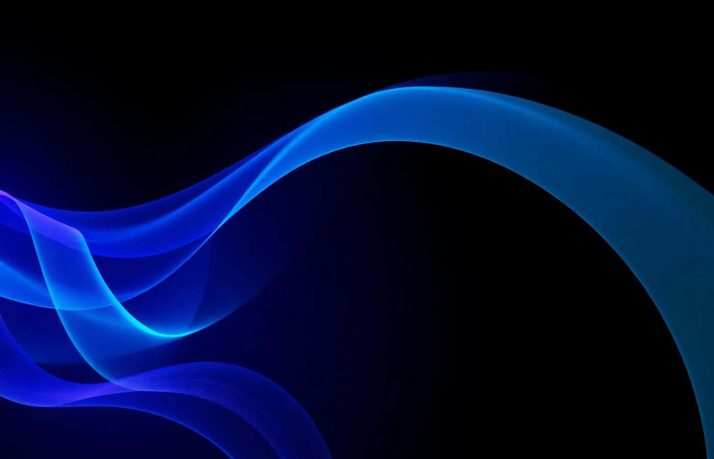 Abstract flowing ribbons of blue and purple light representing data flow